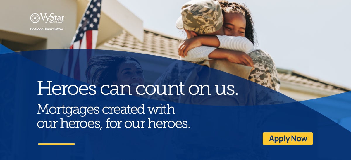 Woman embracing man in uniform in front of house